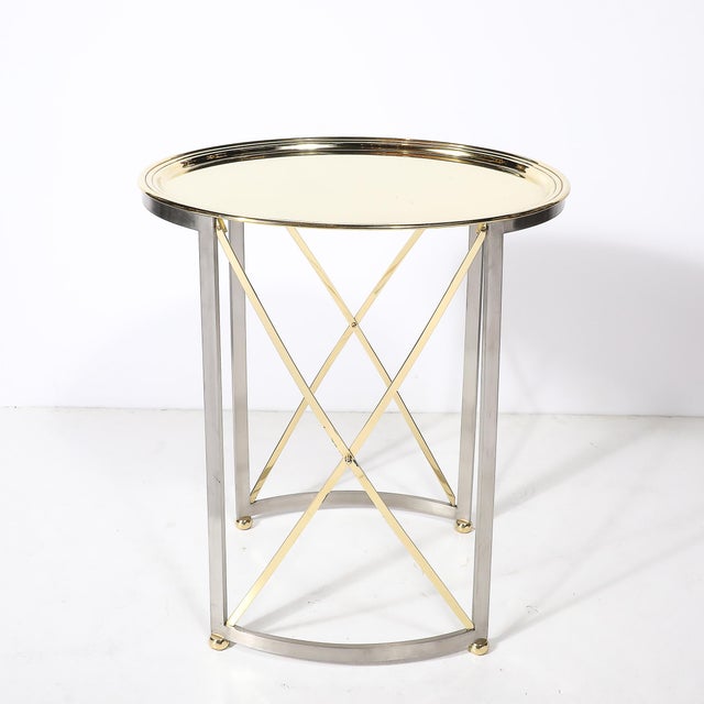 This striking Mid-Century Modernist side table, crafted circa 1950, is a refined example of minimalist design paired with...