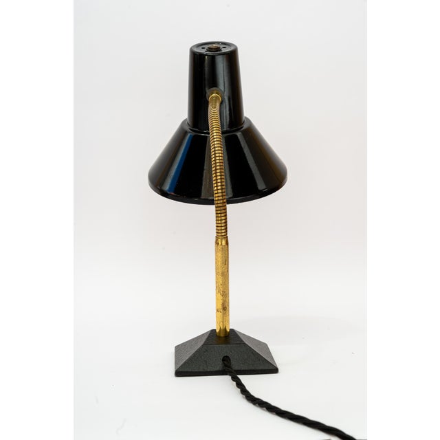 Adjustable vintage table lamp vienna around 1960s Original condition. European Plug (up to 250V).The wiring of this item...
