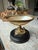 French gilt bronze lovebirds sharing a worm above a nacre shell nest. The nest is in a tree with a cobra nestled at the...
