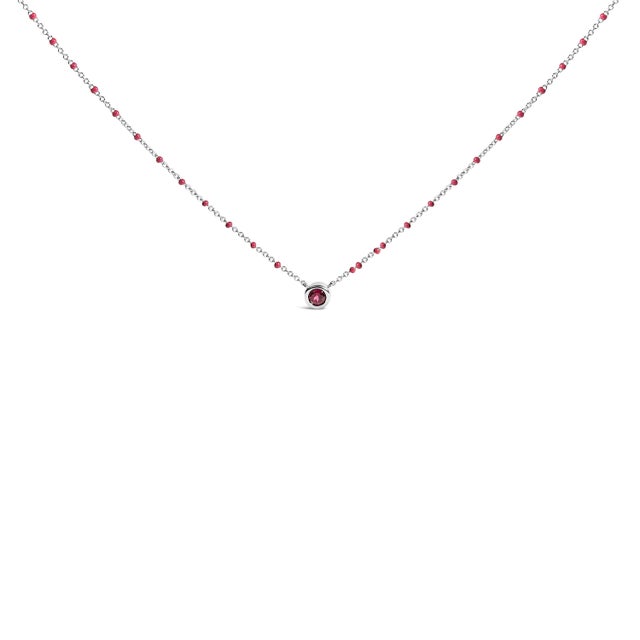 Crafted from luminous .925 sterling silver, this 18-inch necklace embodies elegance with a vibrant twist. The sleek chain...