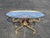 French style oval iron coffee table. Romantic scroll work and diminutive size make this table very feminine. Dimensions...