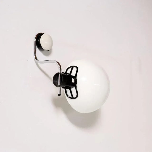 Quite rare wall lamp model "Libellula" by Emilio Fabio Simion for Harvey Guzzini, Italy 1970s. Chromed metal bar and...