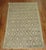 Decorative 20th century Turkish rug in taupes and tans with a compelling repetitive pattern. Affordably priced too. 4'9''...