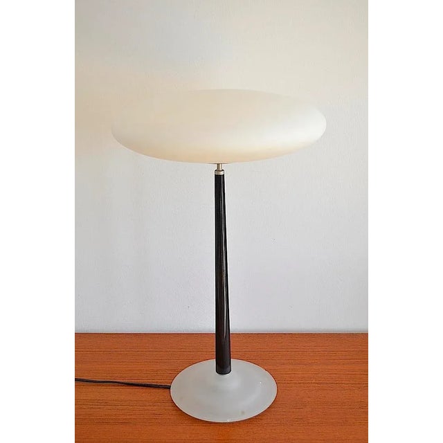 Postmodern design classic. The table lamp Pao T2 by Matteo Thun for the company Arteluce from the 1980s - 1990s. The table...