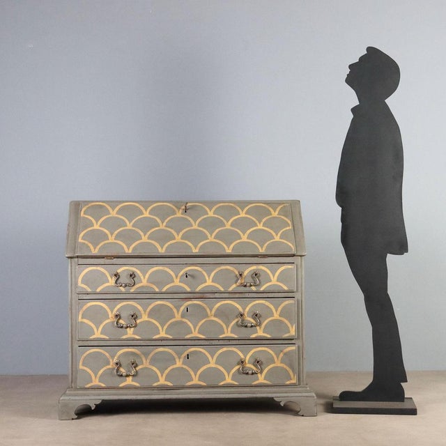 Walnut bureau crafted in the mid-20th century using antique elements, representing a blend of tradition and modern...