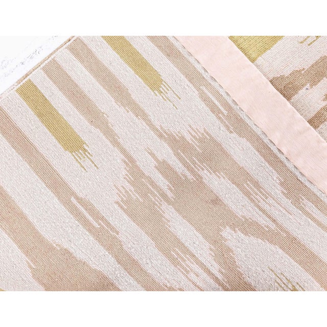 Infused with contemporary flair and crafted with time-honored techniques, this luxurious hand-knotted silk runner...