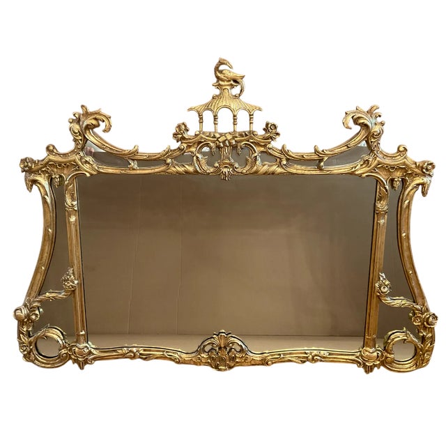 This is an exceptional vintage gilt wall mirror by Friedman Brothers, celebrated for producing some of America's finest...