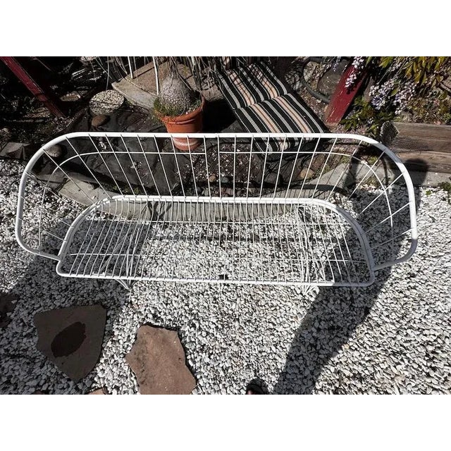 midcentury wrought iron outdoor/patio ‘Grenada’ sofa and matching chair made by Homecrest Bottemiller, circa 1968. This...