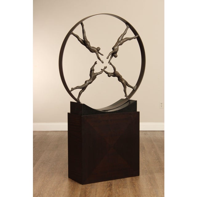 Quality Hand Crafted Metal Sculpture 'Reaching For Center' on Granite Base With Custom Parquetry Veneered Pedestal