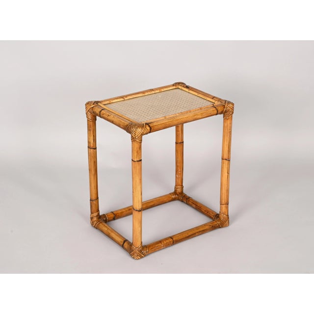 Amazing mid-century wicker and bamboo coffee table with glass top. This delightful piece was designed in Italy during the...