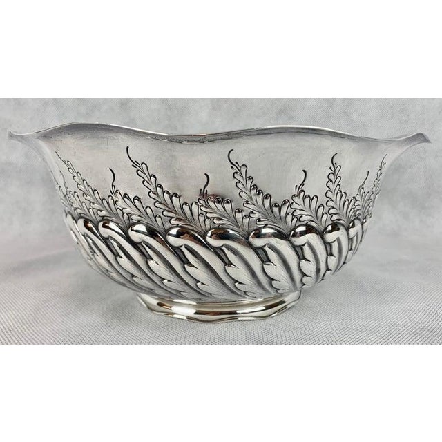 Very handsome Bailey, Banks & Biddle sterling silver 9.5” diameter bowl with a scalloped edge. The body of the bowl has...