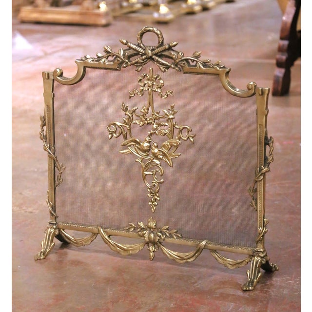 Decorate your hearth with this elegant antique style fireplace screen. Crafted in France circa 1960, the rectangular...