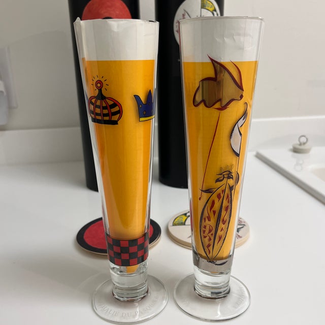 Vintage Ritzenhoff beer glasses on their original boxes. Includes matching coasters as well. Specially designed art work...