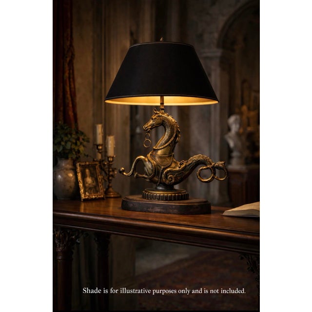 A mid-20th-century Italian or European cast brass table lamp depicting a hippocamp, the mythological sea horse associated...