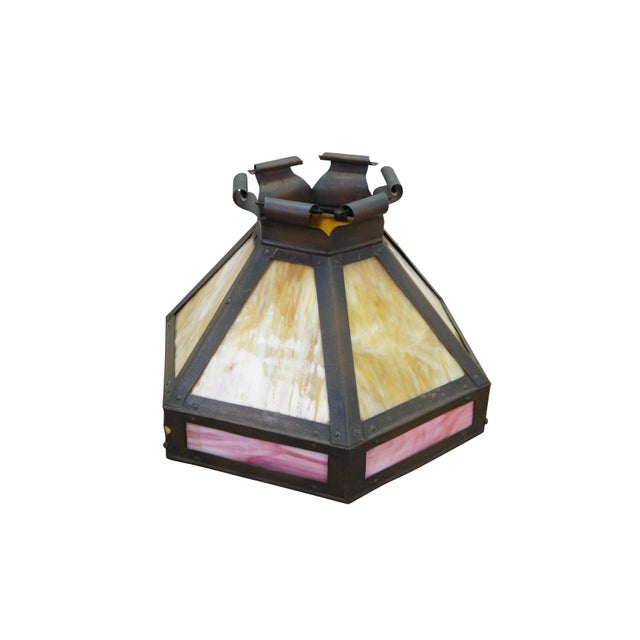 Antique Arts and Crafts / Mission style slag glass lamp shade features an eight-sided, octagonal panel design framed in...