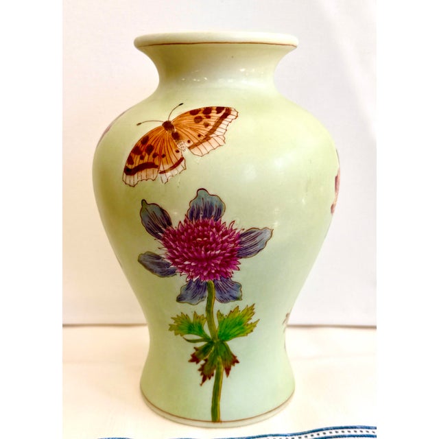 Vintage Chinese celadon‑glazed vase with beautifully hand‑painted butterfly and floral motifs in rich, layered colors. The...