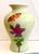 Vintage Chinese celadon‑glazed vase with beautifully hand‑painted butterfly and floral motifs in rich, layered colors. The...