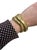 This classic quintessential bracelet by Sidney Garber is designed as three interlocking flexible tubogas bangles....