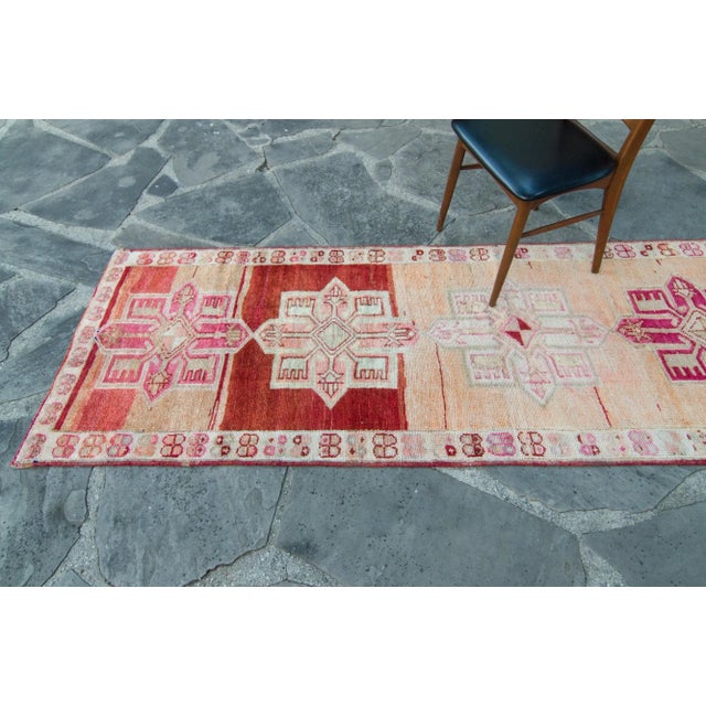 This geometrically patterned runner exemplifies that feel of a whimsical oasis of medallions and floral life. Featuring...