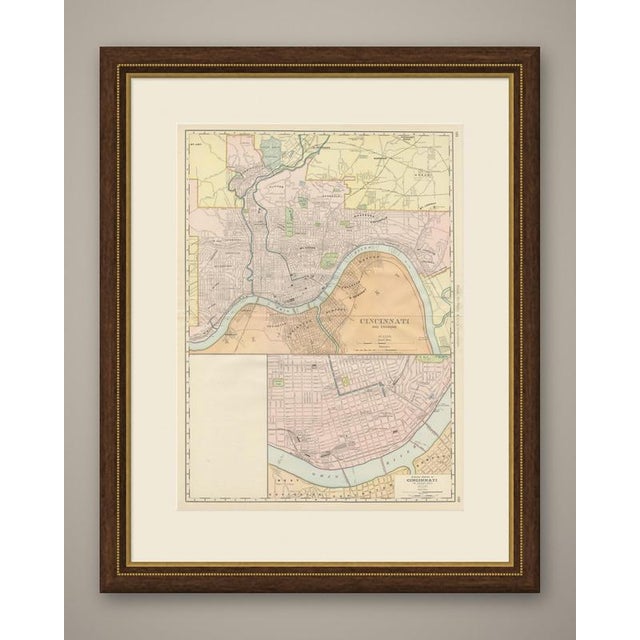 Titled "Cincinnati and Environs", this antique map of Cincinnati by Rand McNally, 1899, reaches across the Ohio River to...