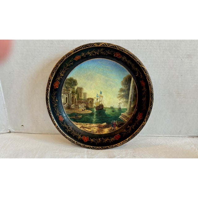 Beautifully painted with sailing vessels in a harbor with exceptionally fine details. A rare artist signed piece.