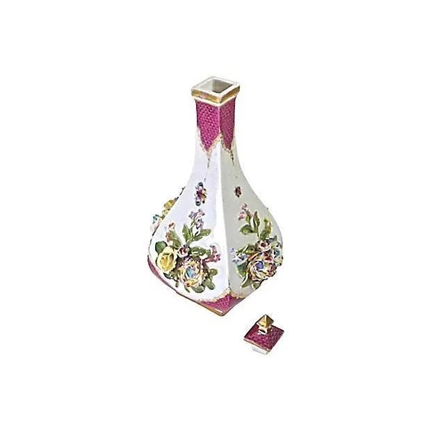 An antique, 19th century, German, Meissen, porcelain, floral and insect decanter with lid. Hand-painted florals are in...