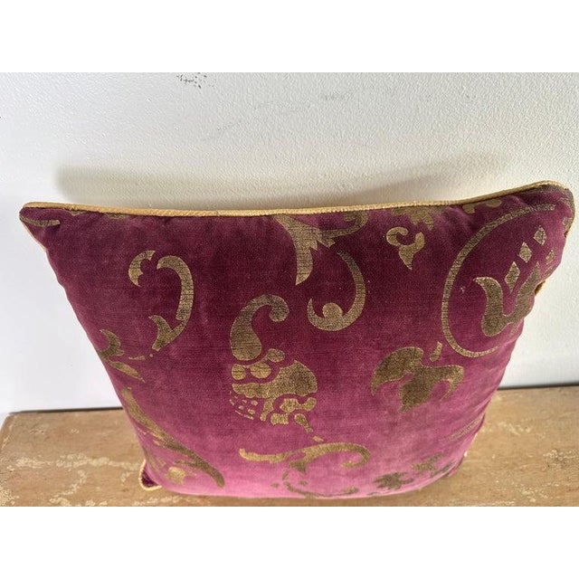 Decorative pillow crafted from an authentic Nomi Design hand-stenciled velvet, featuring an elegant scrolling motif in...