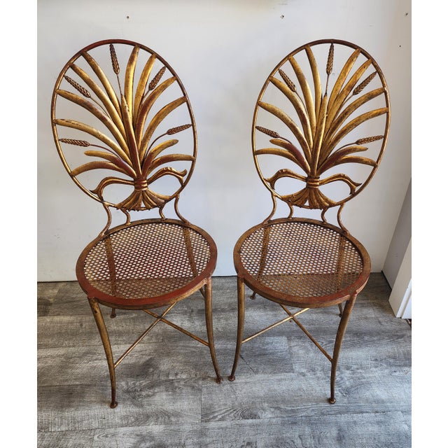 A pair of mid-century Italian gilt metal wheat sheaf chairs, designed and manufactured by the renowned S. Salvadori in...