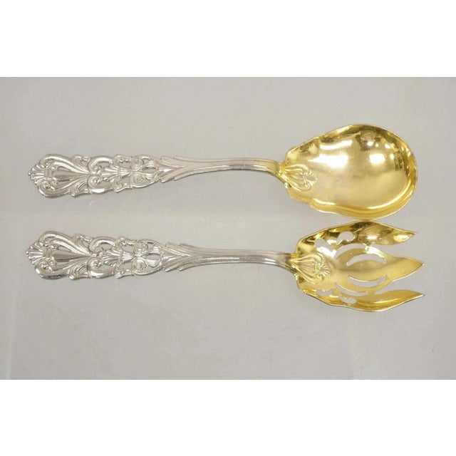Vintage Italian Baroque Style EPNS Silver & Gold Plated Serving Spoon and Fork Set. Circa Mid Late 20th Century....