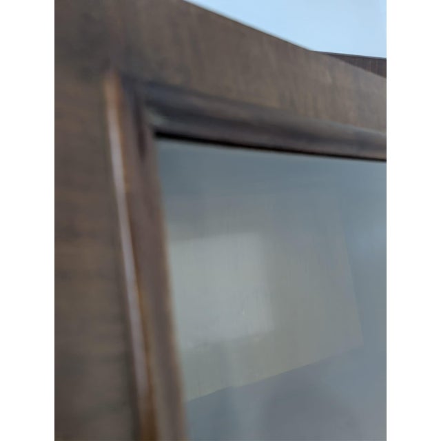 Solid Wood Bookcase in Art Deco Walnut This solid wooden bookcase in Art Deco style is crafted from dark walnut. It...