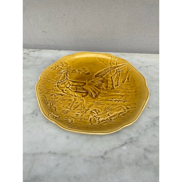 Majolica plate with hen and chicks signed Hippolyte Boulenger Choisy le Roi, circa 1890. The manufacture of Choisy le Roi...