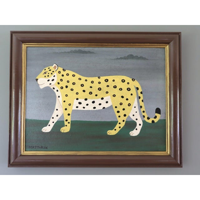 GOLDEN LEOPARD Size: 15 x 18.9 inches (including frame) Oil on board A charming contemporary naïve style painting,...