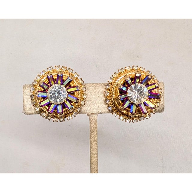 1960s round goldtone round clear center stone surrounded by marquise red aurora borealis with round clear rhinestones...