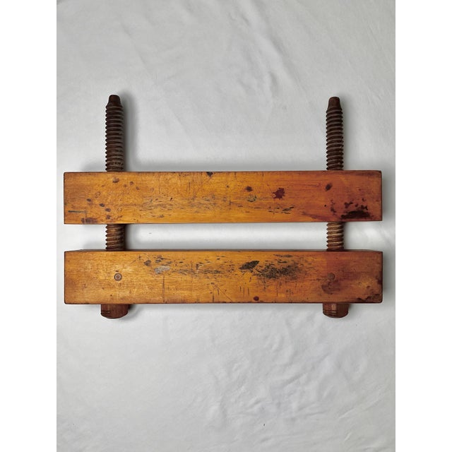 Vintage professional bookbinding finishing press with flat-edge handle. Solid wood blocks with two large hand-screws to...