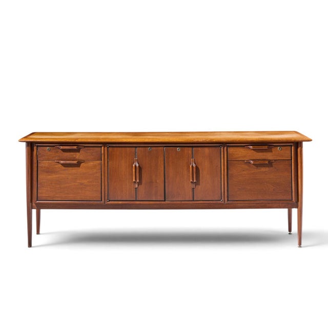 Alma Castilian Mid Century Walnut Credenza This credenza measures: 77.5 wide x 21 deep x 29 inches high Good Vintage...