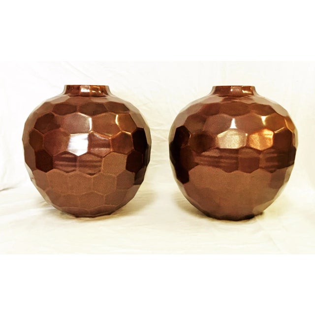 Gorgeous pair of statement vases! These large geometric vases are made of ceramic with a copper/ bronze color glazed...