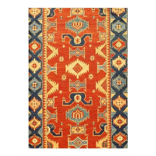 Super Fine KAZAK Design Handmade Hand-knotted rug Hand-Spun Lambswool on a Cotton Foundation Vegetable Dyed This rug is...