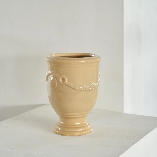 Anduze Pot in Cream Yellow, France, Mid 20th century. This well sized Anduze pot has a warm cream yellow colour and a...