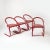 Set of 4 postmodern dining chairs in red lacquered metal and leatherette, italy, 1980s. Original condition, one of the...