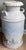 Authentic vintage metal milk can from Roger Dairy of Dayton, Ohio, featuring a charming pastoral landscape graphic with...