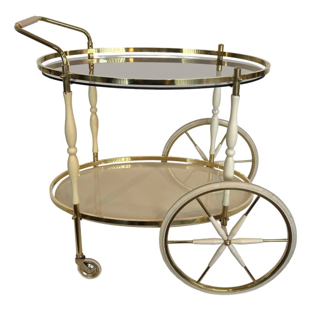1940s Italian oval drinks trolley in brass and lacquered wood For Sale