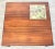 A mid century modern rosewood square coffee table with a tile insert. Made in Denmark. Professionally refinished. 33.5”...