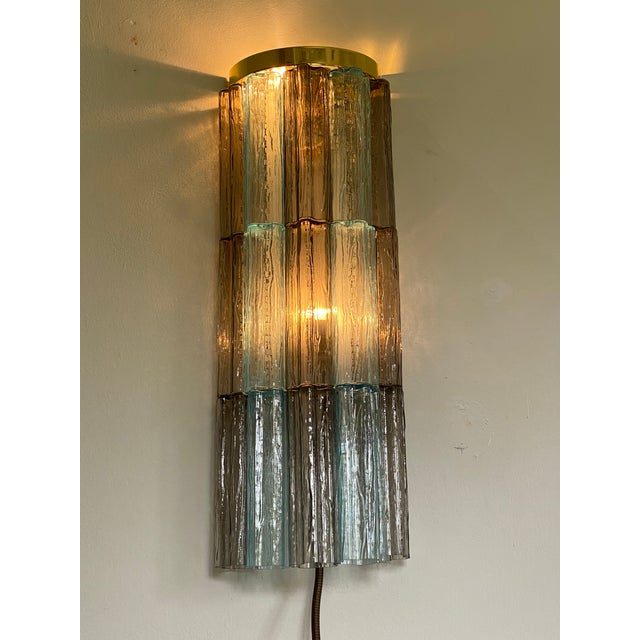 Contemporary“TRONCHI” wall sconce. Two levels of Light- blue, trasparent and grey “TRONCHI” MURANO GLASS Hand-made in...