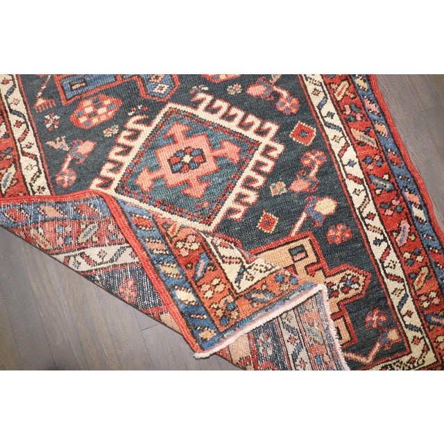 A 1930s small antique persian heriz rug