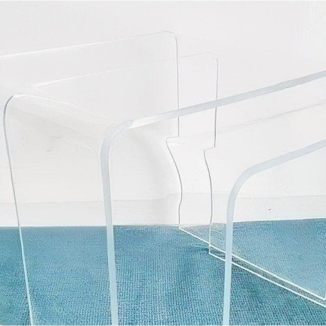 Set of two Mid-century Italian space age acrylic glass side tables from the 1970s. This set of acrylic glass nesting...