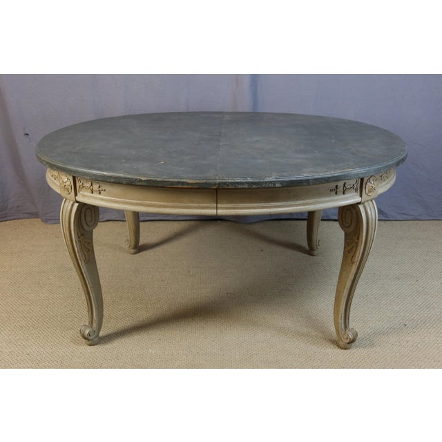 Oval dining table that extends from its closed position with three leaves (1.50m closed x 1.30m and 2.90m x 1.30m at its...