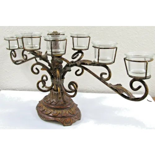 Vintage 8-Piece Centerpiece Metal Candle Holder with Glass The base is sculpted resin and the scrolled arms are of metal....