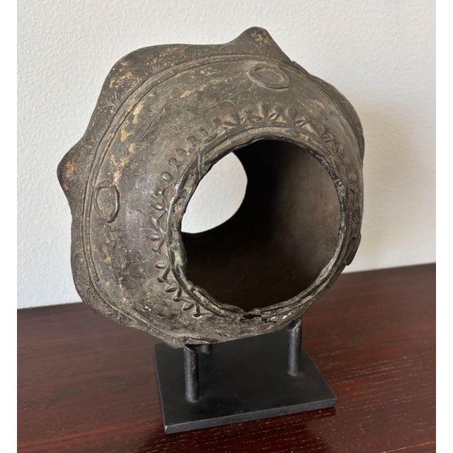 Large West African Bronze Currency Bracelet, Gan People, Burkina Faso, on Custom Stand An exceptional and sculptural...