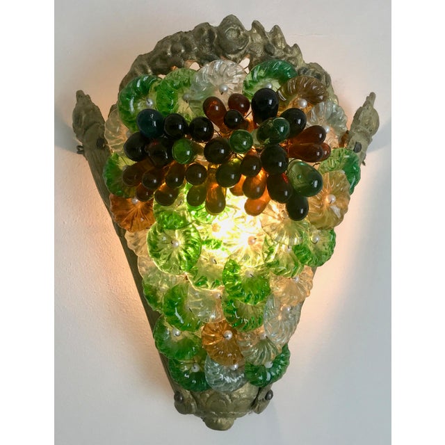 A delightful and colorful Murano glass sconce. This is one of six in my collection and each has its own color story.