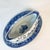 We have here a Blue Willow Antique Gravy Boat from Ridgway Porcelain out of England. The piece has an attached under...